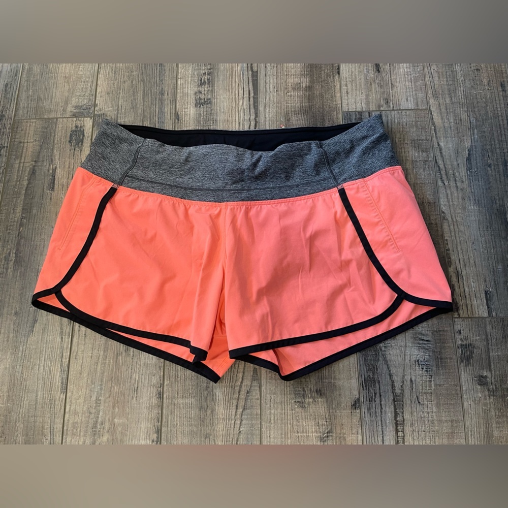 Lululemon women’s peach pink grey shorts 4” inseam size 10